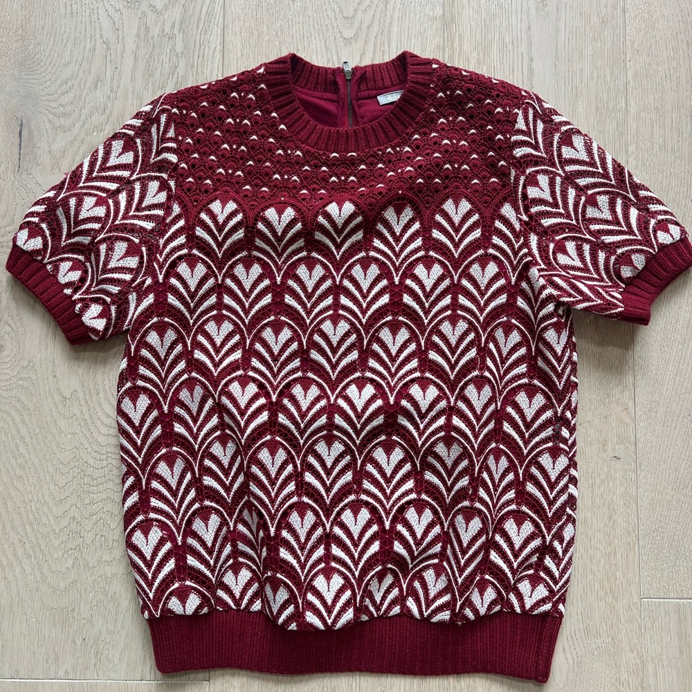 Maroon knit sweater.